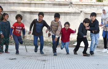 conducted recreational activities for children staying in the collective shelter